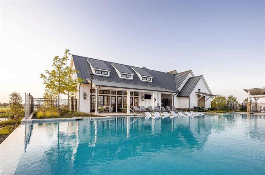 Community pool featuring fence