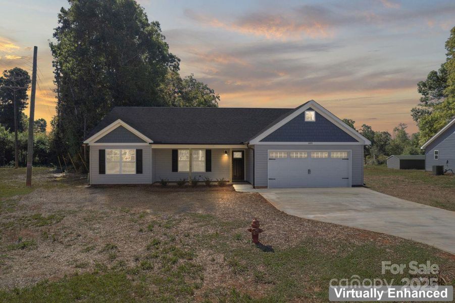Front exterior of a new home in , Asheboro, NC, highlighting curb appeal (Image 1). Front exterior of a new home in , Asheboro, NC, highlighting curb appeal (Image 1).