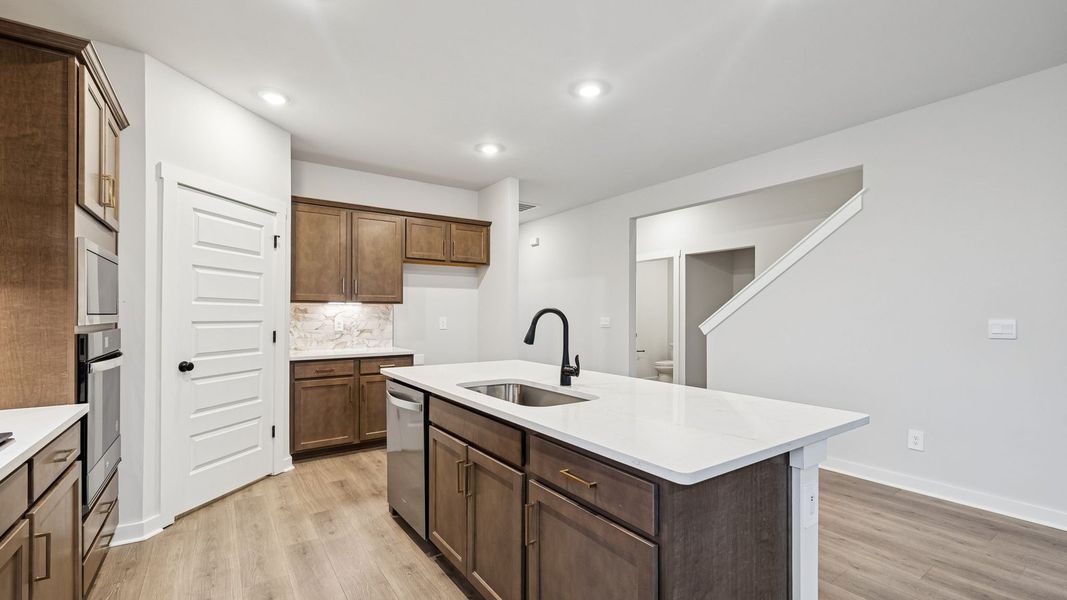 Furnished interior view inside a new home in Harvest Point, Spring Hill (Image 9).