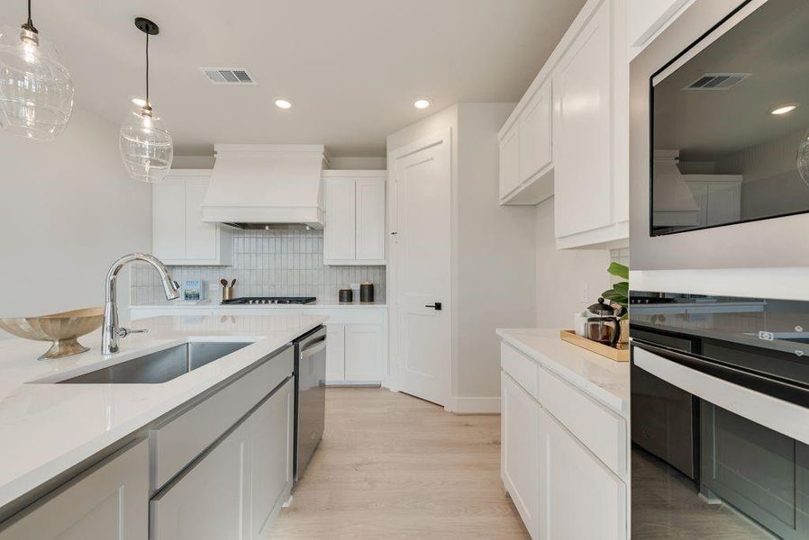 Furnished interior view inside a new home in Trails at Cottonwood Creek, Rowlett (Image 11).