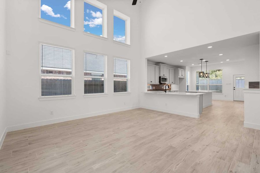 Representative unfurnished interior of a home built from the Dublin by Chesmar Homes in Sunterra, Katy (Image 6).
