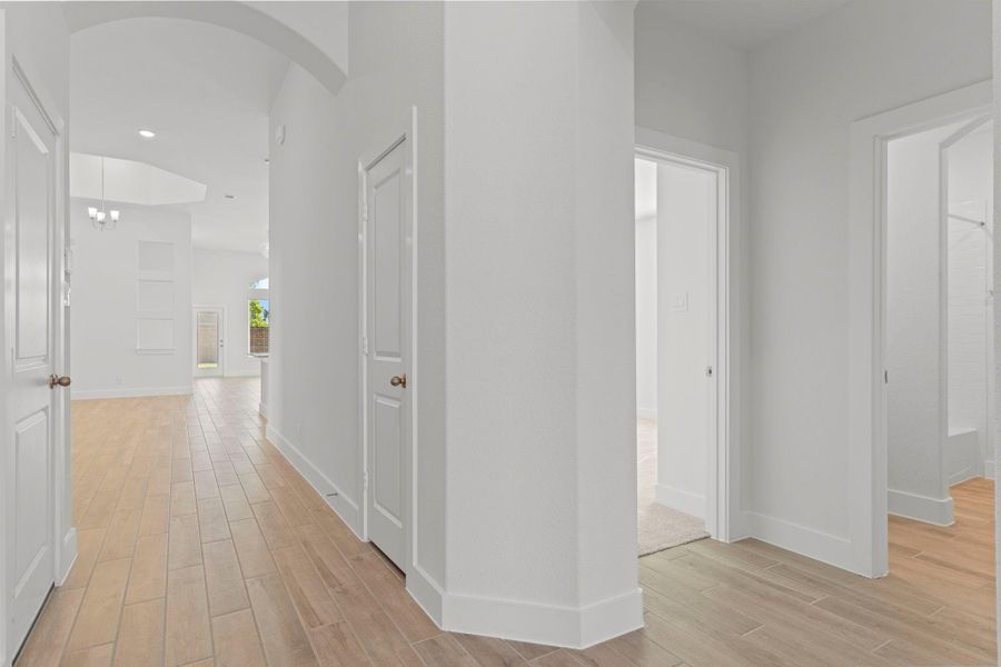 Wow look at that view going into the main family area. To the right tucked away is two guest bedrooms and full bathroom.