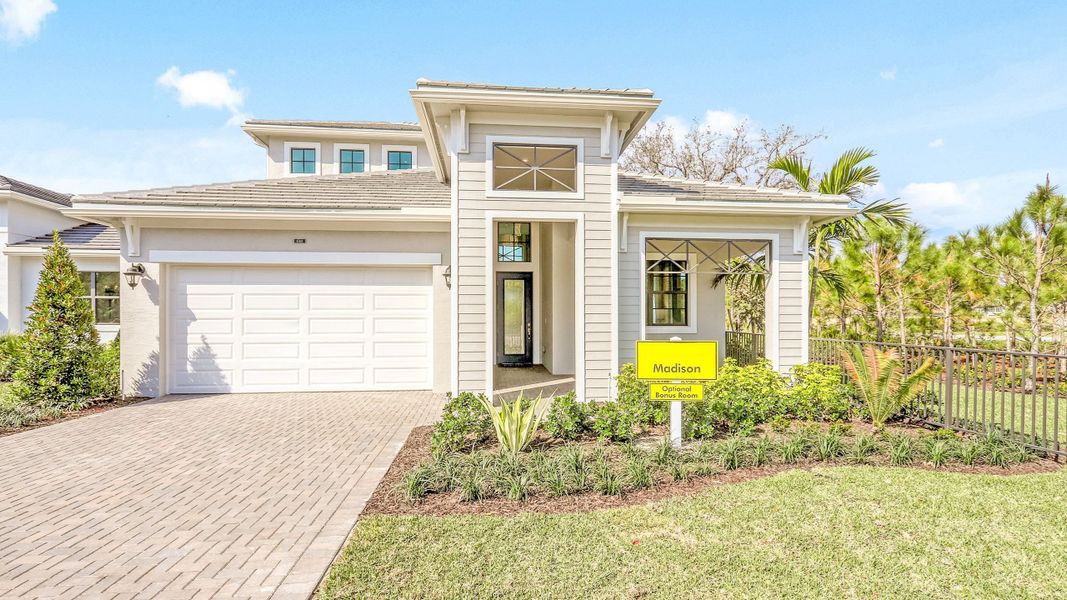 Front exterior of a home in the The Cove at Park Trace community, located in Stuart, FL (Image 10).