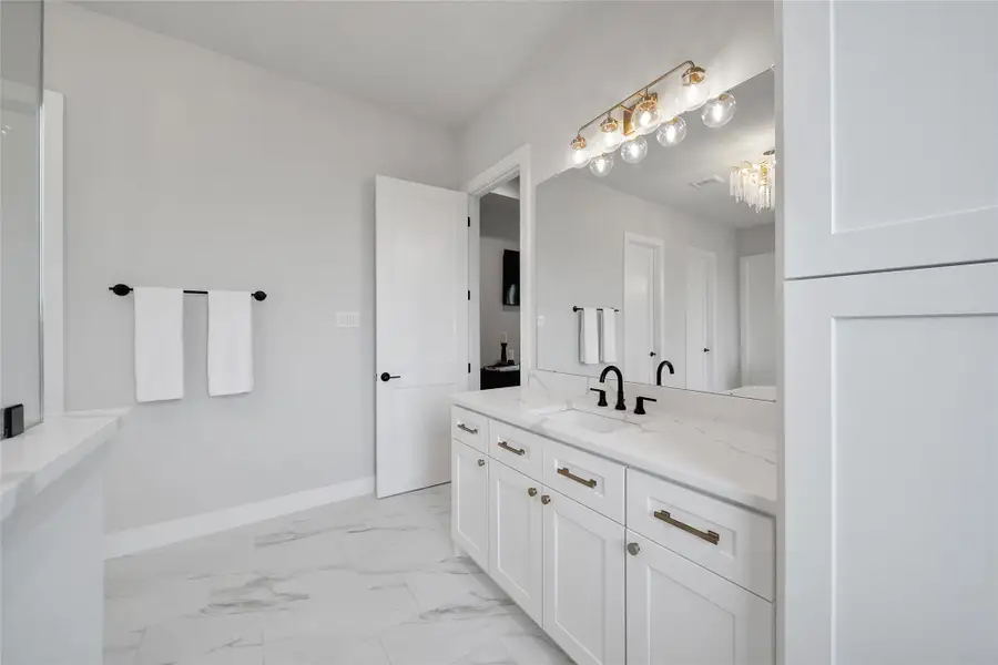 Furnished interior view inside a new home in ARTAVIA, Conroe (Image 46).