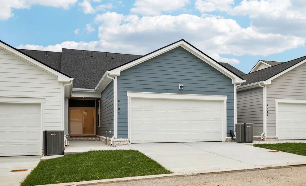 Front exterior of a new home in Stewart's Glen | 55+ Community, Smyrna, TN, highlighting curb appeal (Image 29). Front exterior of a new home in Stewart's Glen | 55+ Community, Smyrna, TN, highlighting curb appeal (Image 29).