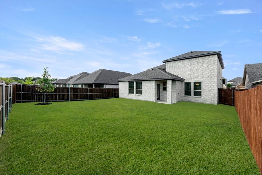 Representative exterior photo of a completed home built from the Raleigh by Impression Homes in Northspur, Terrell, TX (Image 5).