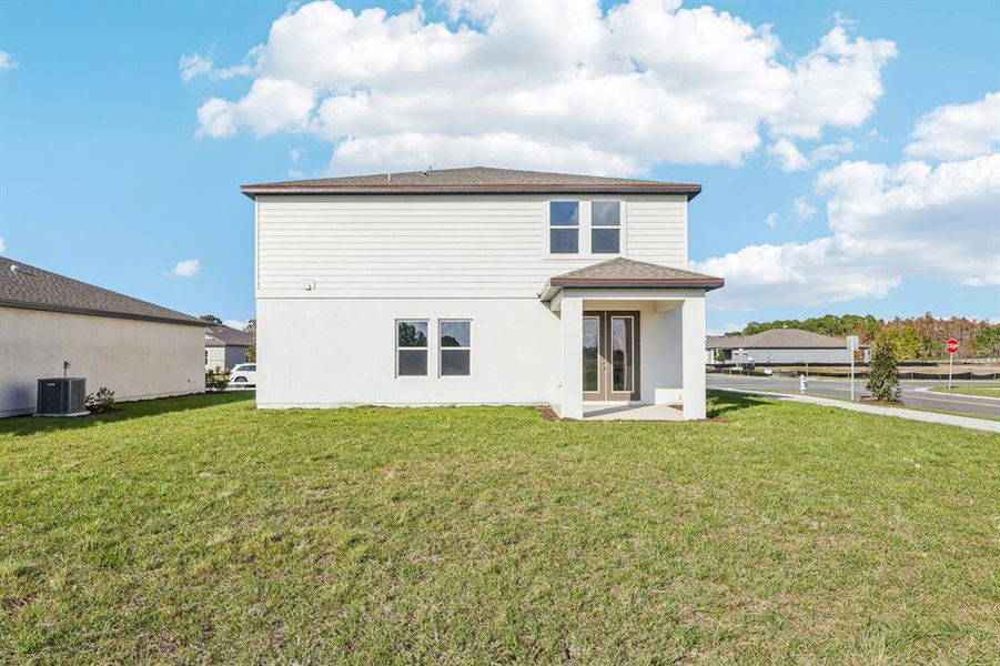 Exterior details and patio area of a home in Tyson Reserve, St. Cloud (Image 4).