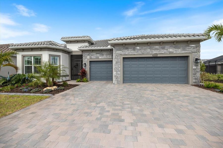 Front exterior of a new home in , Englewood, FL, highlighting curb appeal (Image 26).