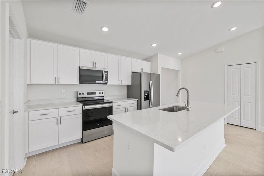 Furnished interior view inside a new home in Cape Coral, Cape Coral (Image 7). Furnished interior view inside a new home in Cape Coral, Cape Coral (Image 7).