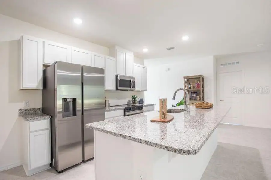 Furnished interior view inside a new home in Coastal Communities, Edgewater (Image 9).