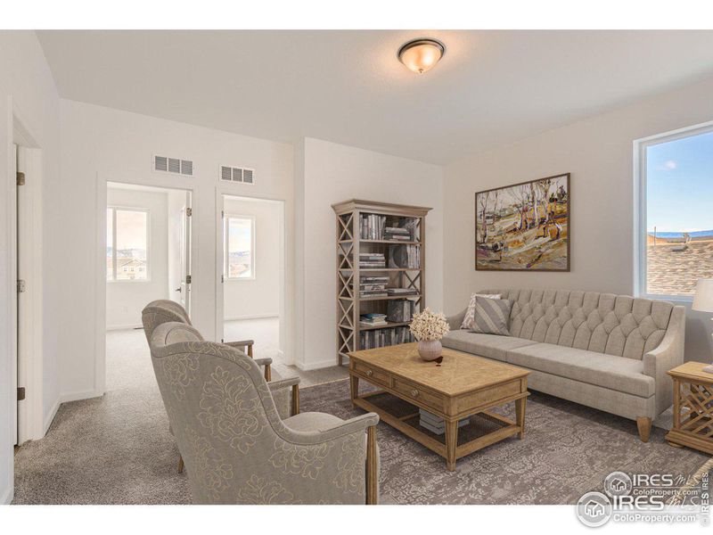 Upstairs family room/loft area, virtually staged