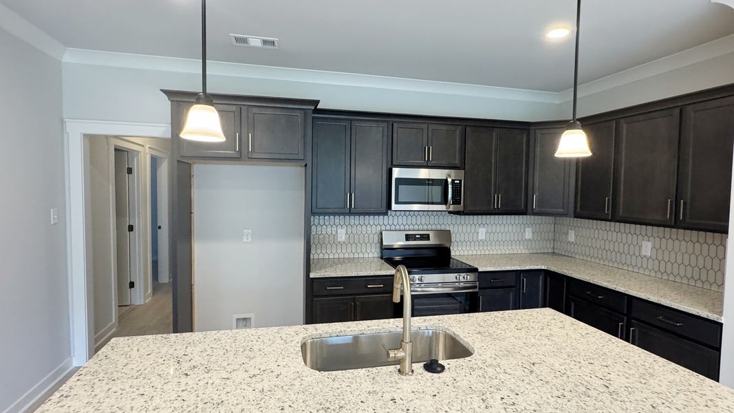 Furnished interior view inside a new home in The Greens at Legacy Townhomes, Springfield (Image 6).