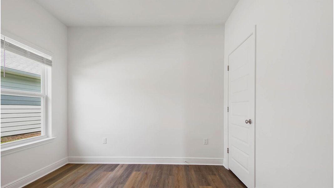 Representative unfurnished interior of a home built from the Rhett by D.R. Horton in Caballeros Estates At Hombre, Panama City Beach (Image 28).