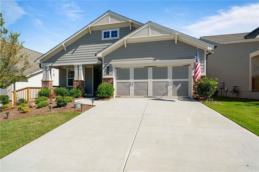 Front exterior of a new home in Hickory Bluffs, Canton, GA, highlighting curb appeal (Image 20).