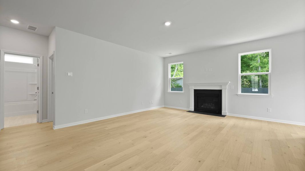 Representative unfurnished interior of a home built from the FORRESTER by D.R. Horton in Founders Corner, Summerville (Image 10).