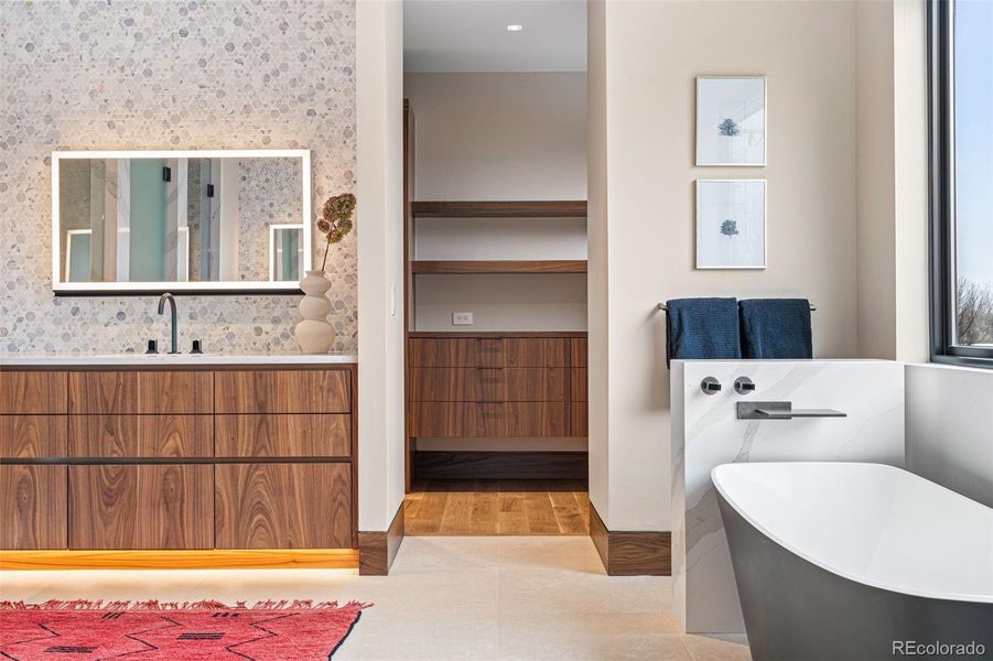 Two separate showers (one equipped with steam), beautiful Shiloh Cabinetry and Pental Quartz Slab counters, Wetstyle Undermount Sinks, Venezia Sink Faucets, Nostromo Shower Heads, Venezia Hand Shower, and a Neorest Dual Flush Smart Toilet bidet.