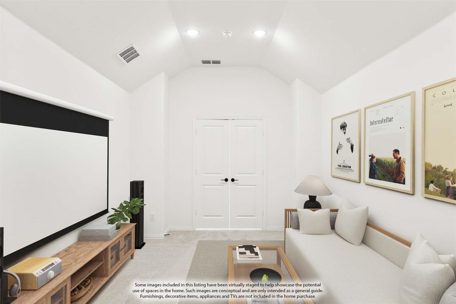Media room with vaulted ceiling, projection screen, sofa, and wood media console Media room with vaulted ceiling, projection screen, sofa, and wood media console