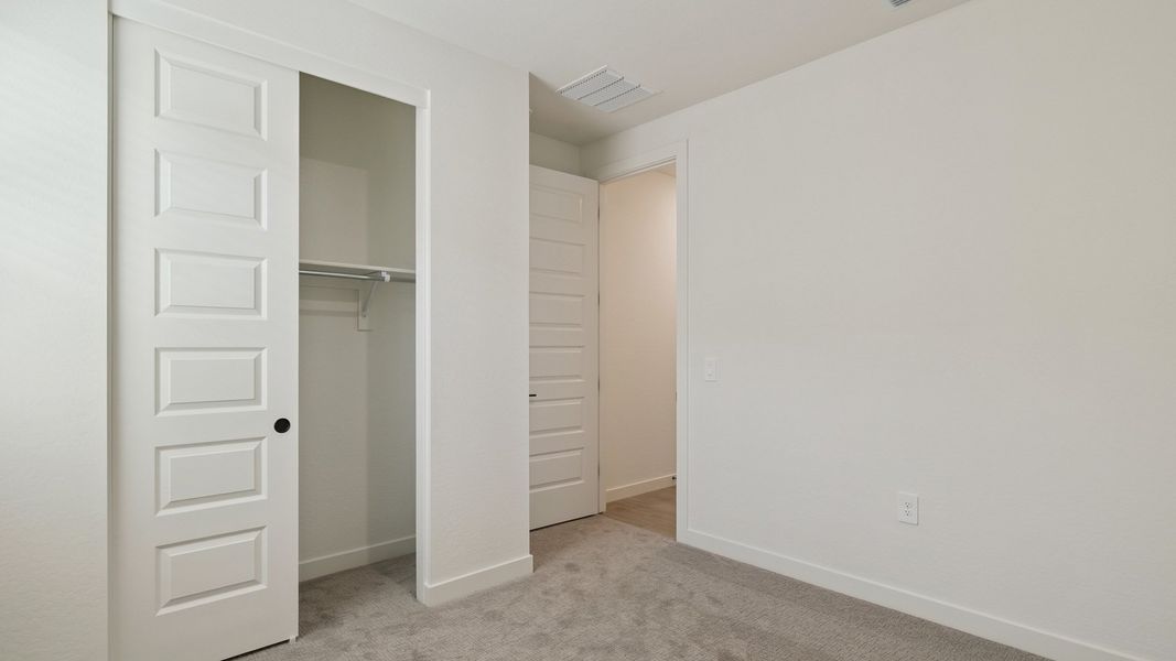 Spacious, unfurnished interior of a new home in The Ridge at Stone Butte, Phoenix (Image 30).