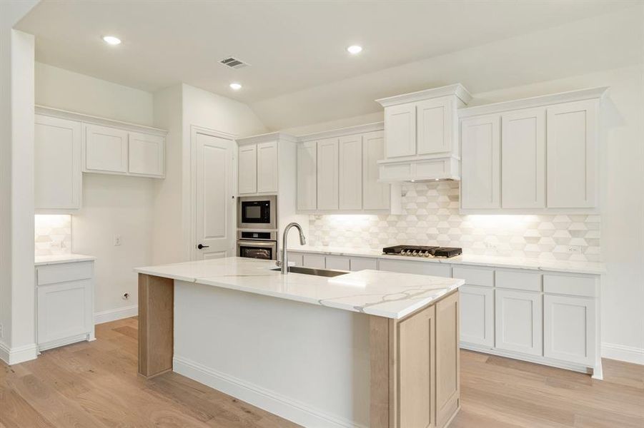 Furnished interior view inside a new home in Windsong Ranch Classic 61, Prosper (Image 6). Furnished interior view inside a new home in Windsong Ranch Classic 61, Prosper (Image 6).