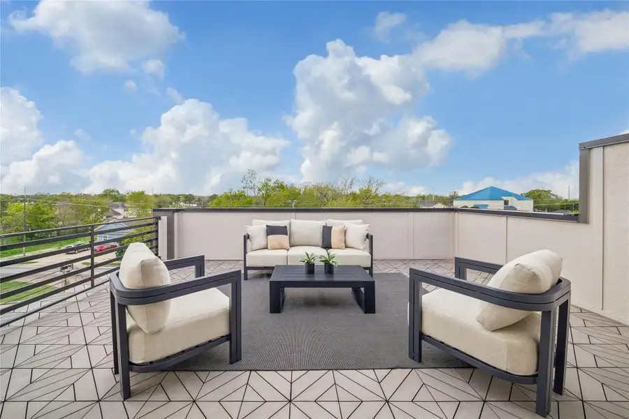 Exterior details and patio area of a home in , Houston (Image 3).