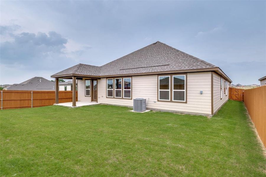 Front exterior of a new home in , Crandall, TX, highlighting curb appeal (Image 15). Front exterior of a new home in , Crandall, TX, highlighting curb appeal (Image 15).