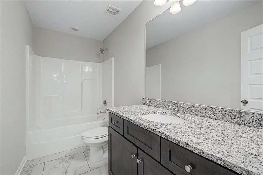 Furnished interior view inside a new home in Traditions at Cedarcrest, Dallas (Image 9).