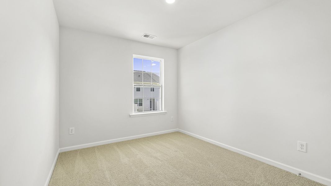 Spacious, unfurnished interior of a new home in North Village Townes, Greensboro (Image 11).