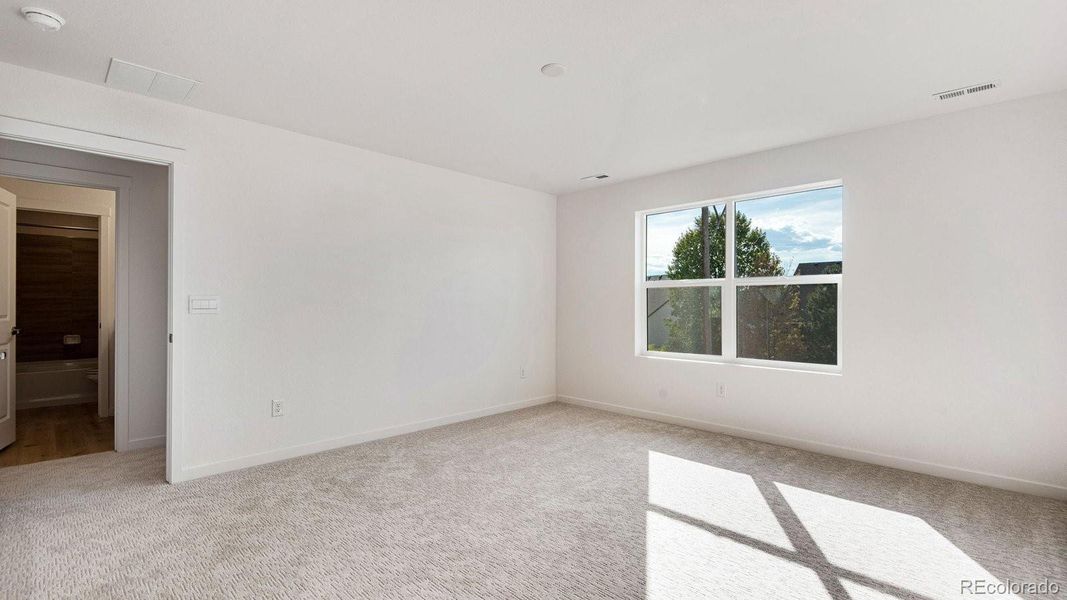 Spacious, unfurnished interior of a new home in Trails at Crowfoot, Parker (Image 32).