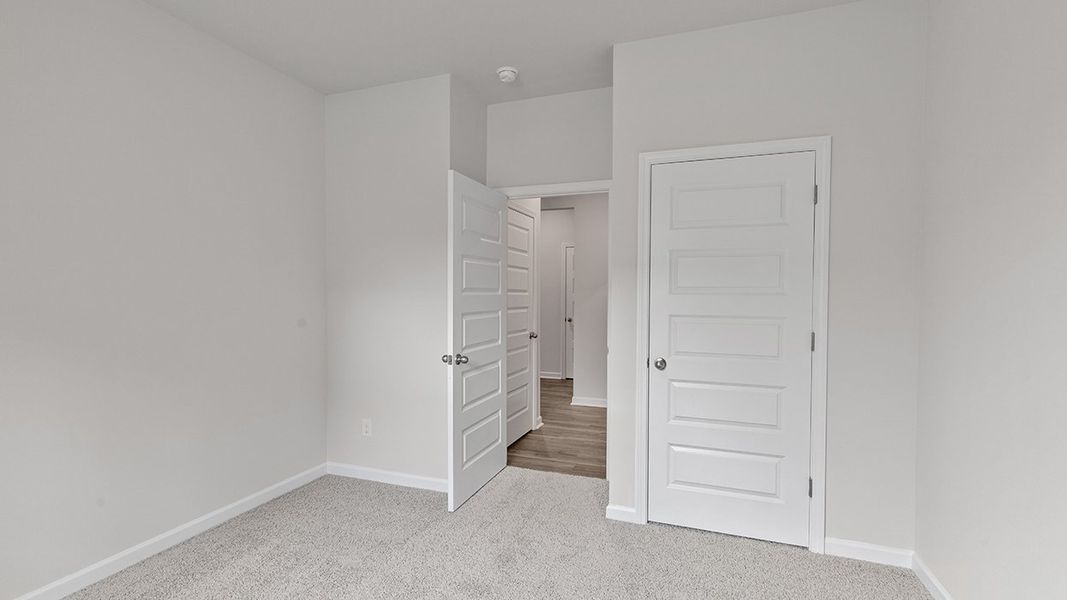 Representative unfurnished interior of a home built from the Celia by D.R. Horton in Teamon Pointe, Griffin (Image 22).