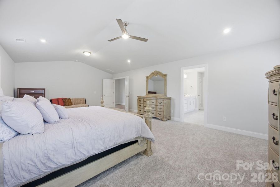 Large Primary with double entry doors, vaulted ceiling and primary en-suite.