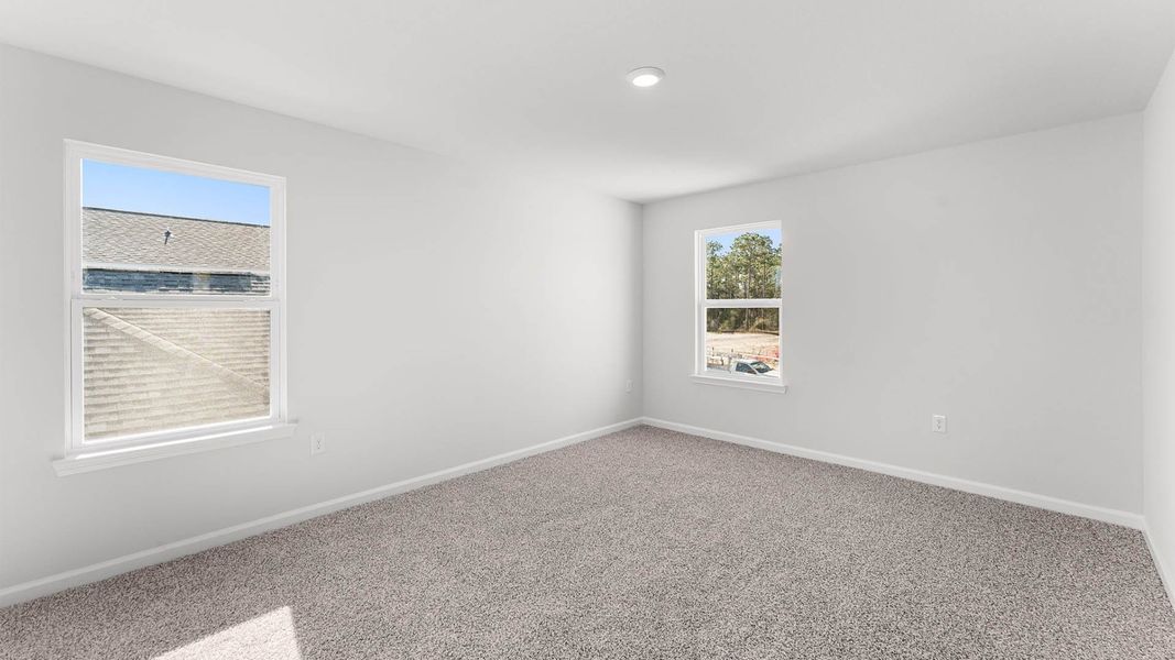 Representative unfurnished interior of a home built from the The Aisle by D.R. Horton in Chateau Nemours, Port Saint Joe (Image 26).