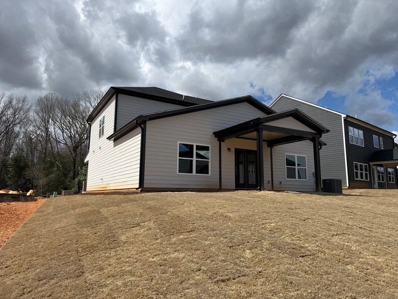 Exterior details and patio area of a home in Rowland's Grant, Fuquay Varina (Image 3). Exterior details and patio area of a home in Rowland's Grant, Fuquay Varina (Image 3).