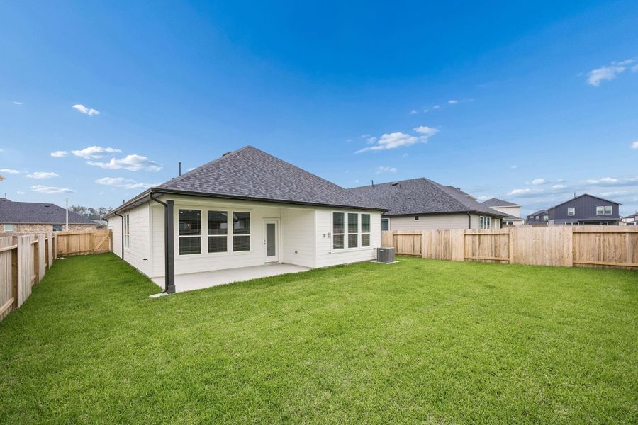 Exterior details and patio area of a home in Montgomery Bend, Montgomery (Image 4).
