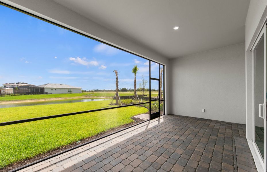 Exterior details and patio area of a home in TerraWalk at Babcock Ranch, Alva (Image 2).