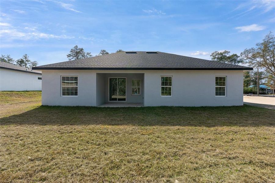 Exterior details and patio area of a home in , Ocala (Image 3).