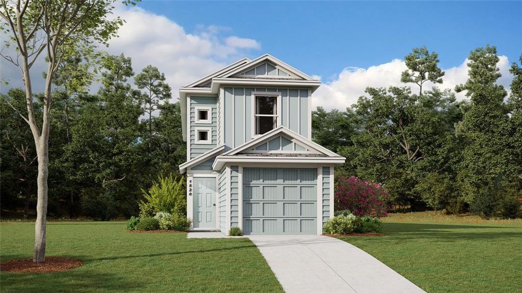 View of front of home with a front lawn and a garage