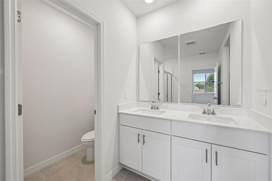 Furnished interior view inside a new home in Ridgehaven - Villas, Ormond Beach (Image 7).