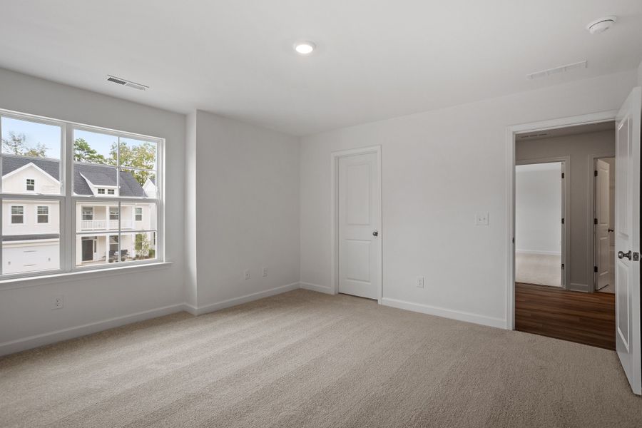Spacious, unfurnished interior of a new home in Georgias Landing, Raleigh (Image 37).