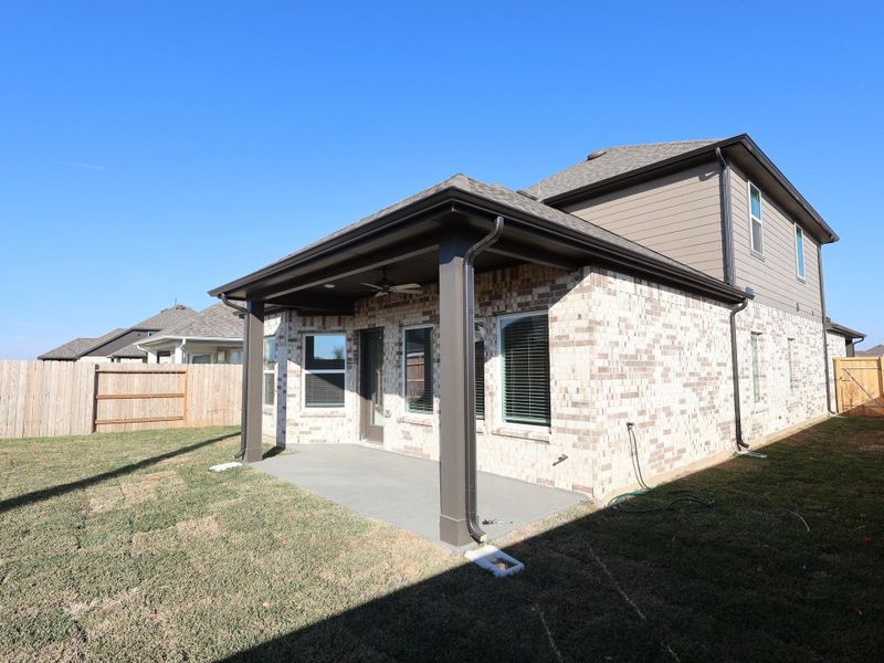 Exterior details and patio area of a home in Marvida, Cypress (Image 4).