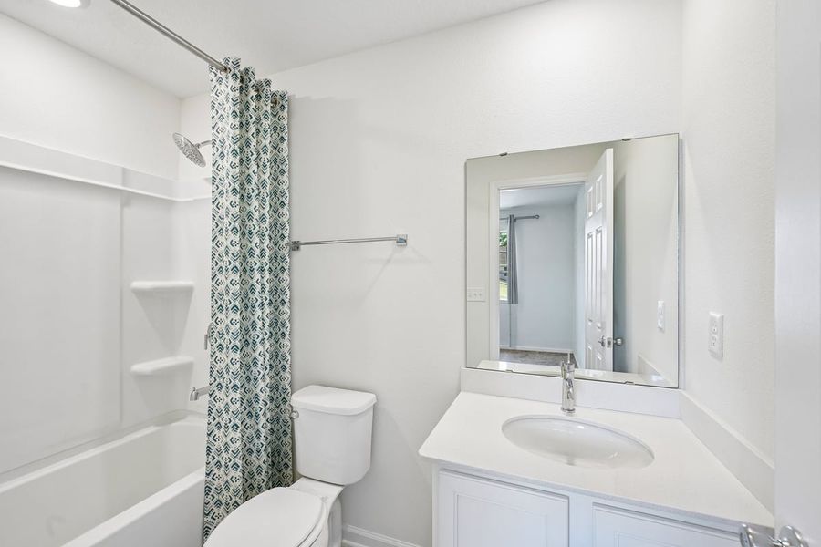 Furnished interior view inside a new home in Orchard Park Townhomes, St. Augustine (Image 11).