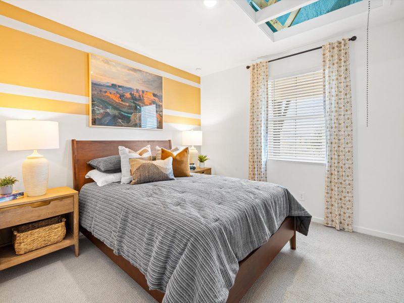 Secondary bedroom in the Arlo floorplan modeled at Teravalis