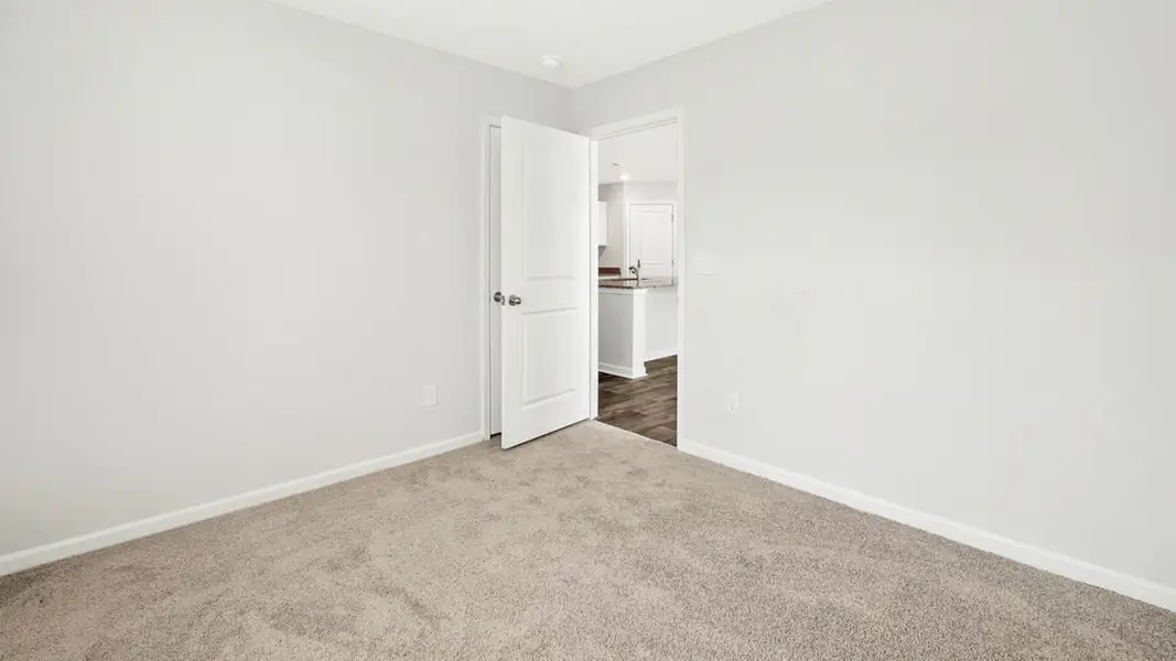 Spacious, unfurnished interior of a new home in Indigo Preserve Townhomes, Leland (Image 28).