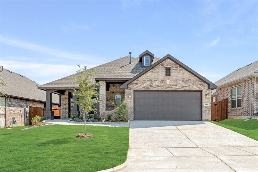 Front exterior of a new home in Godley Ranch Classic, Godley, TX, highlighting curb appeal (Image 2). Front exterior of a new home in Godley Ranch Classic, Godley, TX, highlighting curb appeal (Image 2).