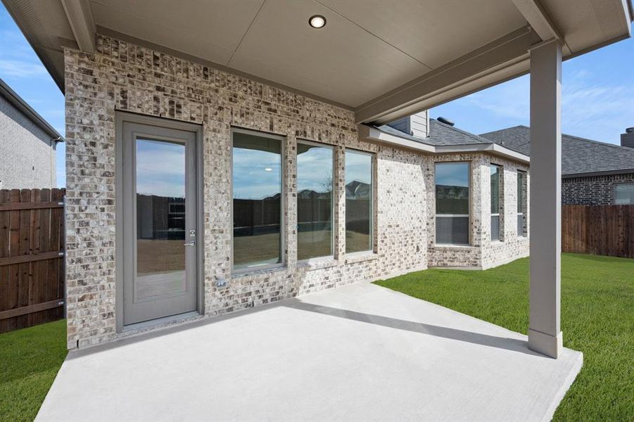 Exterior details and patio area of a home in The Retreat, Waxahachie (Image 28). Exterior details and patio area of a home in The Retreat, Waxahachie (Image 28).