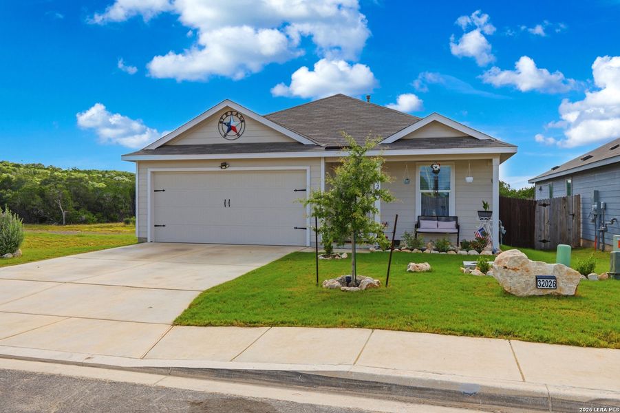 Front exterior of a new home in Hidden Trails, Bulverde, TX, highlighting curb appeal (Image 20). Front exterior of a new home in Hidden Trails, Bulverde, TX, highlighting curb appeal (Image 20).