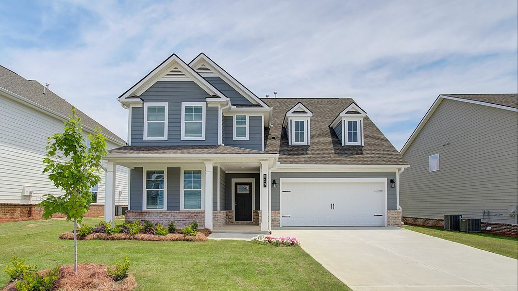 Representative exterior photo of a completed home built from the Drayton by DRB Homes in Cooper Park, McDonough, GA (Image 21).