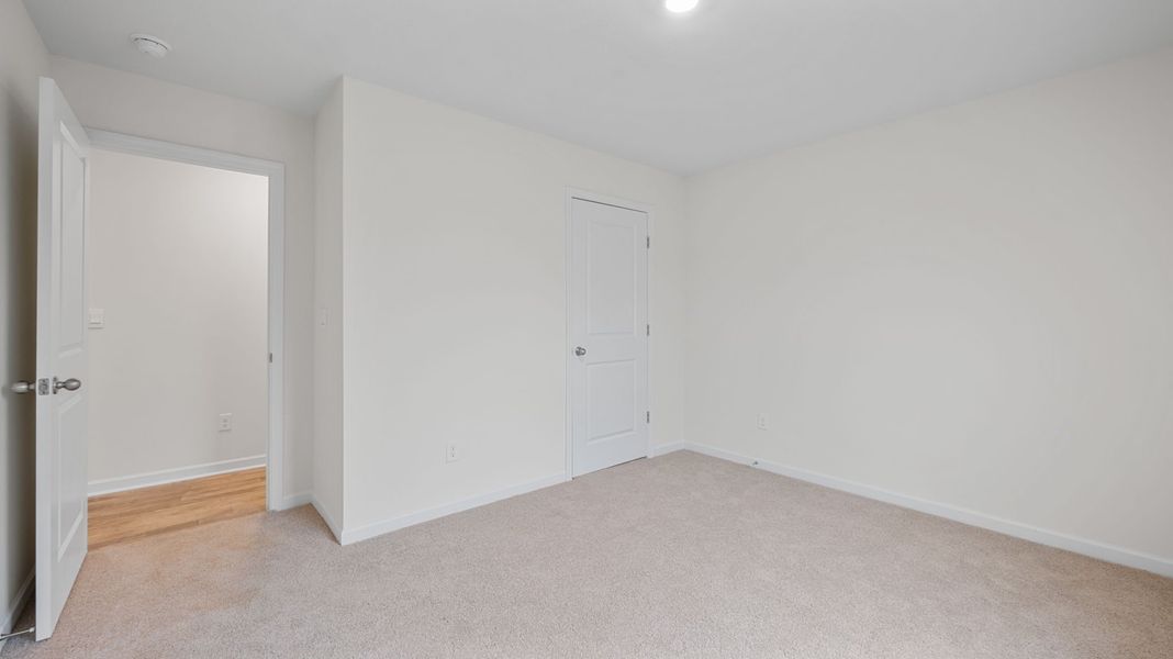 Representative unfurnished interior of a home built from the Lewis by D.R. Horton in Crescent Ridge, Niota (Image 12).