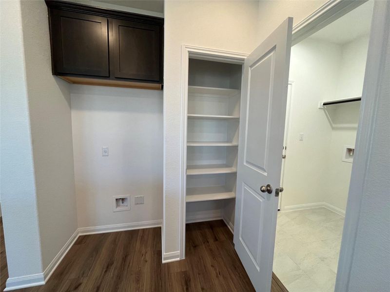 Kitchen pantry. For demonstration purposes only. This will be the same interior layout. Colors can vary.