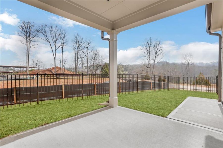 Exterior details and patio area of a home in Marble Tree, Ball Ground (Image 28).