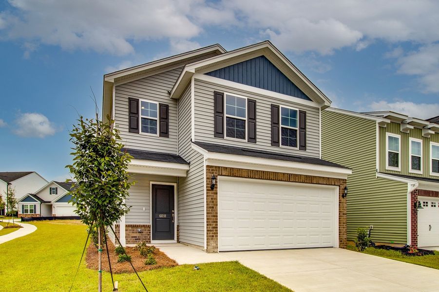 Front exterior of a new home in Ellington, Elgin, SC, highlighting curb appeal (Image 19).
